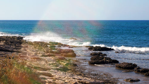 Scenic view of sea against clear sky