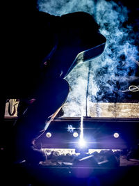 Man in illuminated nightclub