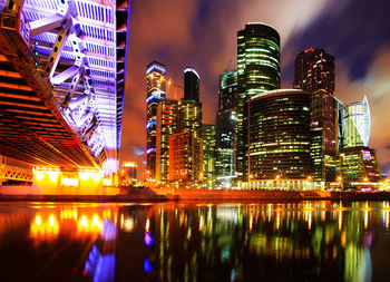 The night lights of the skyscrapers of the moscow city district on the moscow river.