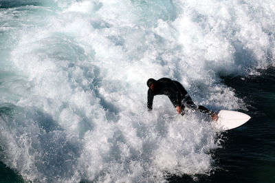 Man surfing in sea