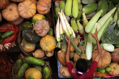 High angle view of vendor with vegetables