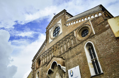 Low angle view of ornate building against sky