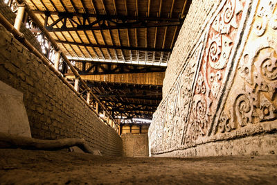 Low angle view of graffiti on old building