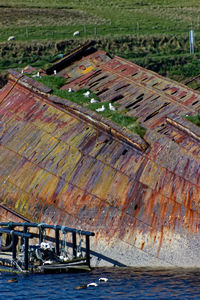 High angle view of abandoned ship on sea shore