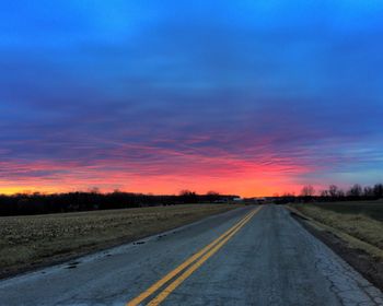Empty road at sunset