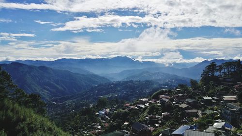 Scenic view of town against sky