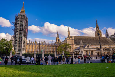 A crowd gather for an anti-brexit rally at the houses of parliament.
