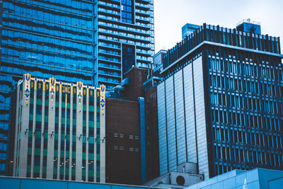 Low angle view of modern building against sky