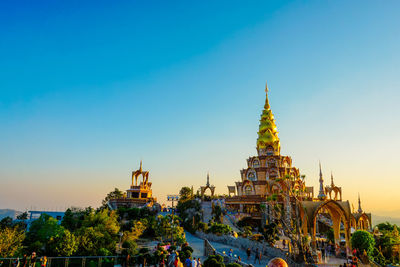 View of temple building against blue sky