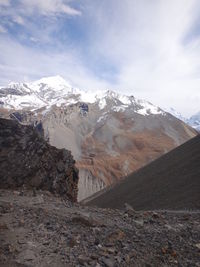 Scenic view of snowcapped mountains against sky