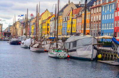 Nyhavn pier with color buildings and ships in copenhagen, denmark