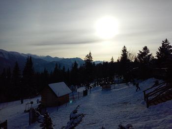 Scenic view of snow covered mountains