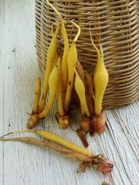 High angle view of vegetables in basket on table