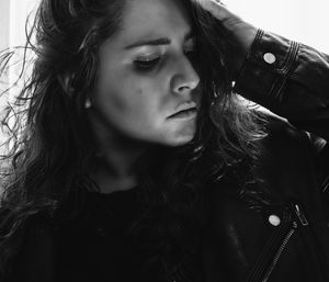 Close-up of young woman looking away