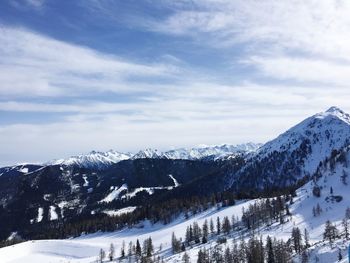 Snowcapped mountains against sky