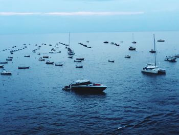 High angle view of sailboats in sea