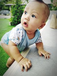 Portrait of cute boy looking away