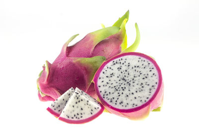 Close-up of fruits against white background