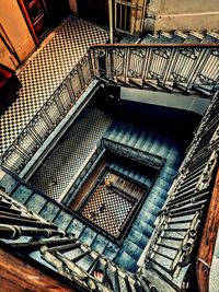 Low angle view of spiral staircase in building