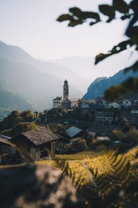 Building on mountain against sky