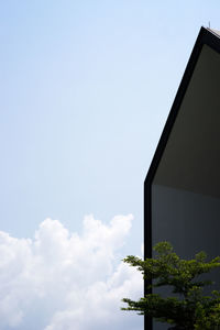 Low angle view of built structure against blue sky