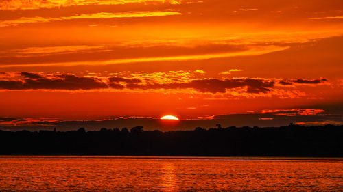 Sunset and cloud reflection in the sea 