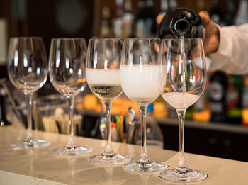 Glass of wine glasses on table