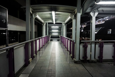 Illuminated railroad station at night