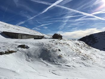 Scenic view of snowcapped mountain against sky