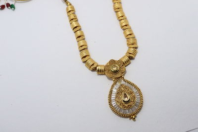 Close-up of cross against white background