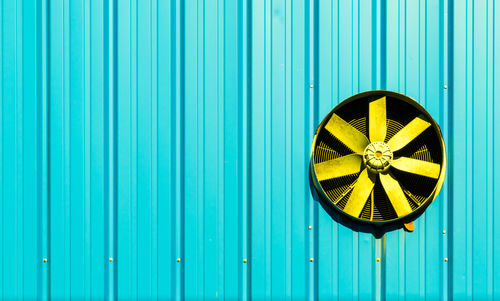 Close-up of exhaust fan on wall