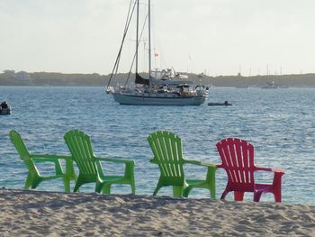 Nautical vessel on sea against clear sky