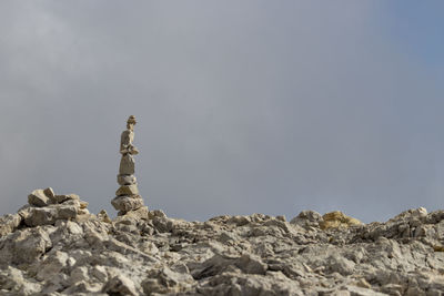 Stack of rocks against sky