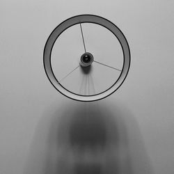 Low angle view of electric fan on ceiling