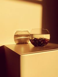 Close-up of drink in glass on table at home