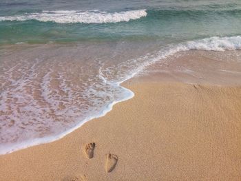 Footprints in the beach sand