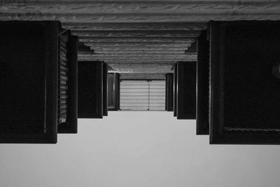 Low angle view of corridor in the dark