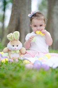 Portrait of cute boy playing with ball