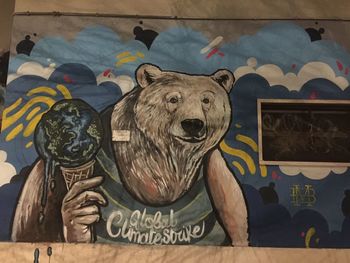 View of a dog against graffiti wall