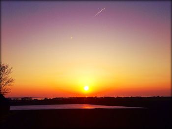 Scenic view of sunset over landscape