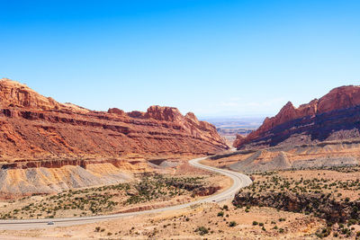 Scenic view of desert against clear sky