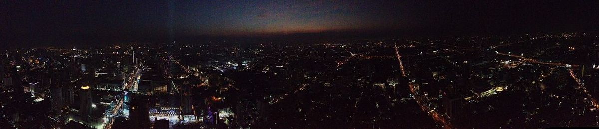 Illuminated cityscape at night