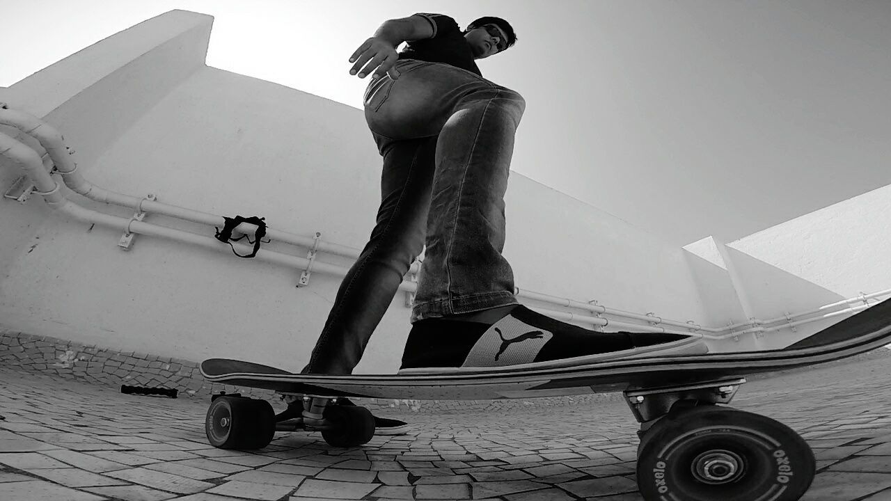 one person, full length, people, skateboard park, sport, real people, adults only, adult, young adult, outdoors, one man only, sports ramp, desaturated, snowboarding, only men, day, motorsport