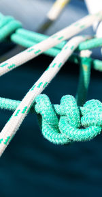 Close-up of rope tied on metal