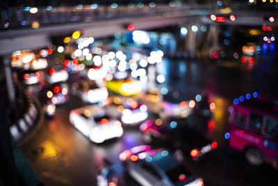 Defocused image of illuminated city street