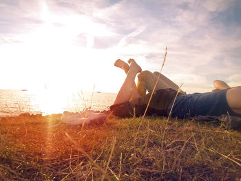 Silhouette of woman at sunset