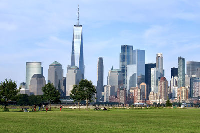 The manhattan skyline in the afternoon as viewed from across the hudson river, liberty state park.