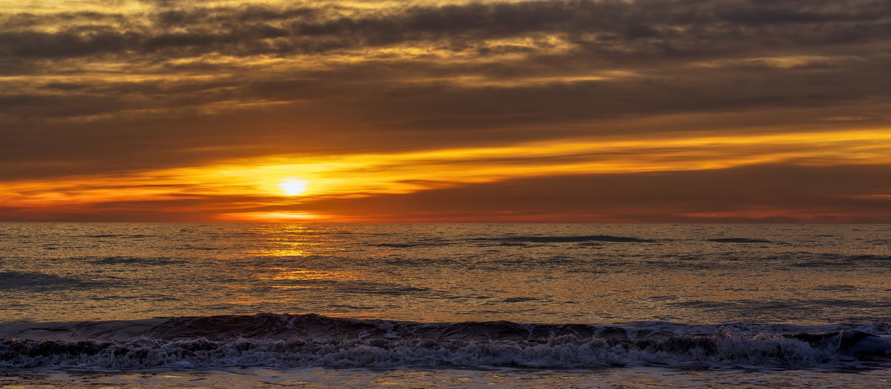 SCENIC VIEW OF SEA AGAINST ROMANTIC SKY