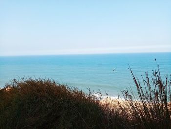 Scenic view of sea against clear sky