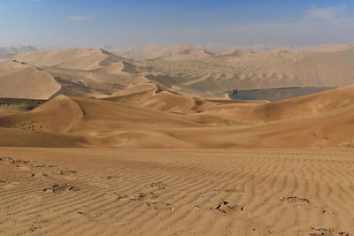 Scenic view of desert against sky